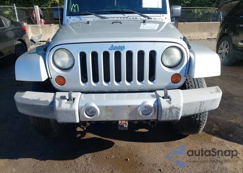 2011 Jeep Wrangler Unlimited Sahara из США, поврежденный, VIN 1J4HA5H1XBL632753